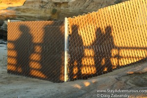 sunset reflection on a fence in La Jolla, California