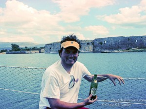 Craig with Mythos Beer on Ionian Sea