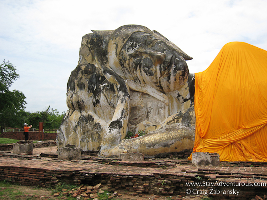 a photo of the large reclining Buddha at Ayutthaya the old Thai Capital outside Bangkok