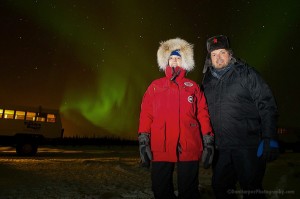 craig and Cathy from Travel Manitoba in Churchill, Manitoba viewing the Norther Lights