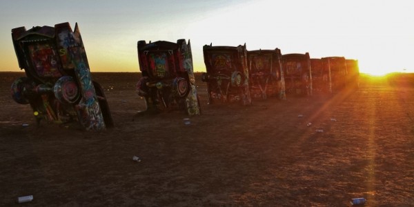 Cadillac ranch at sunset by Maria Falvey