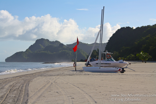 the beach at the Four Seasons Resort Langkawi Malaysia with a Hobie Craft