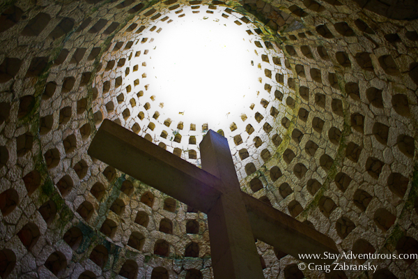 the cross inside the Mayan well at Xcaret, it symbolizes the coming together of religion and the Mayan spirituality
