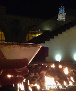 enjoying a night time cocktail in the lobby at La Purificadora in Puebla, Mexico