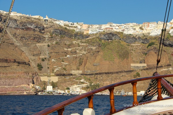 on the tourism excursion boat at sea with the best views of Santorini