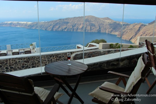 a little toast to the best views of Santorini from a wine bar in Imerovigli