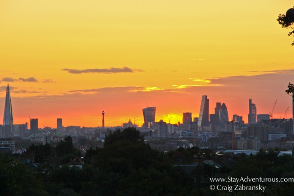 the sunset view of the london skyline from charlton outside greenwich, uk