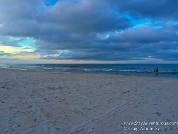 the pink was in the sky and on the sands of Daytona Beach at Sunset