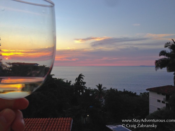 toasting the sunset overlooking the Bay of Banderas in Puerto Vallarta, Mexico