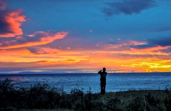 the sunset in issuk-kul, kyrgyzstan in central asia