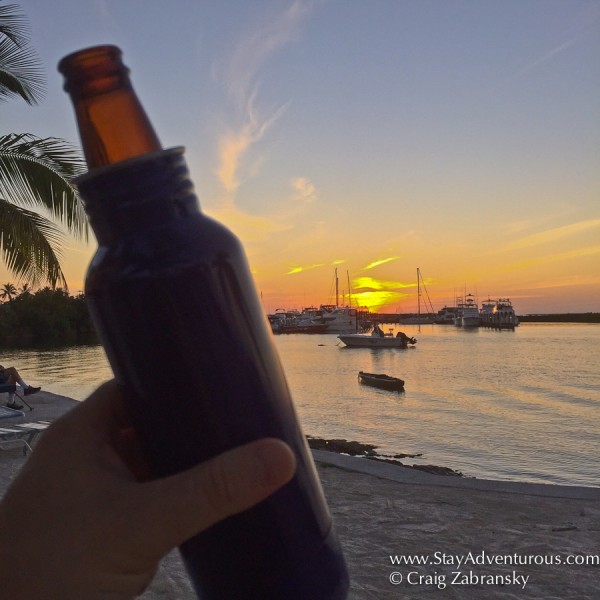 sunset and the bottle keeper on the beach