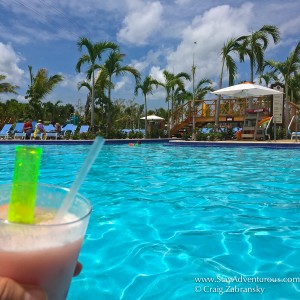 A poolbar drink inside Amber Cove Carnival Cruise Port for Fathom Travel in the Dominican Republic