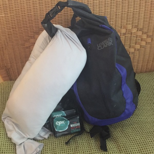 the happy luxe travel pillow scarf with a lewis n clark day dry bag and some epic wipes