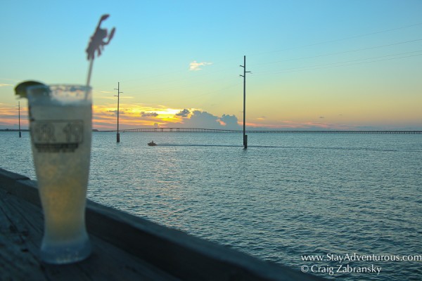 the pier 19 cocktail watching the south padre island, texas sunset