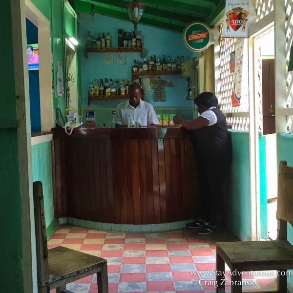 a bartender makes my mojto in a son dance hall in the heart of Santiago de Cuba