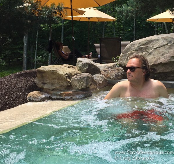 Craig Zabransky with DKNY Sunglasses from SmartBuyGlasses in the hot tub at the lodge at Woodloch