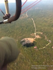 In flight in an Ultralight Aircraft over the Sink Hole of Parrots outside Tuxtla Gutierrez Chiapas, MexicoChiapas, Mexico