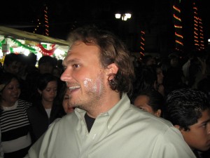 getting your face painted in coyoacan on mexico independence day