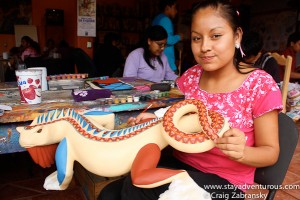 she painted a smile on the iguana...