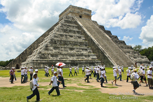 A tour visiting the Pyramid of Kukulcan at Chichen Itza