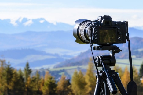 camera taking an image of the mountains