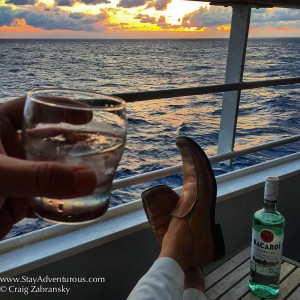 toasting bacardi en route to santiago de cuba on board the fathom mv adonia at sunset