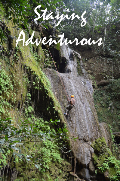 Rappel down the waterfall at Tzimbac Adventure Park 