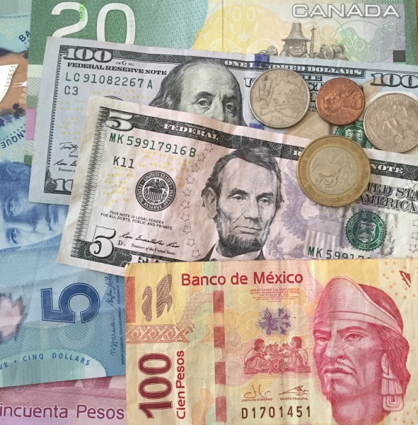 photo of Mexican Pesos, Canadian Dollars and US dollars, MXN, CAD, USD