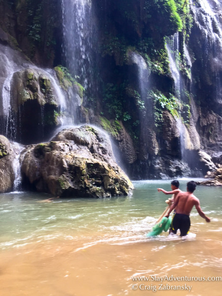 fmaily spear fishing inside aquacero national park outside of tuxtla gutierrez, chiapas, mexico