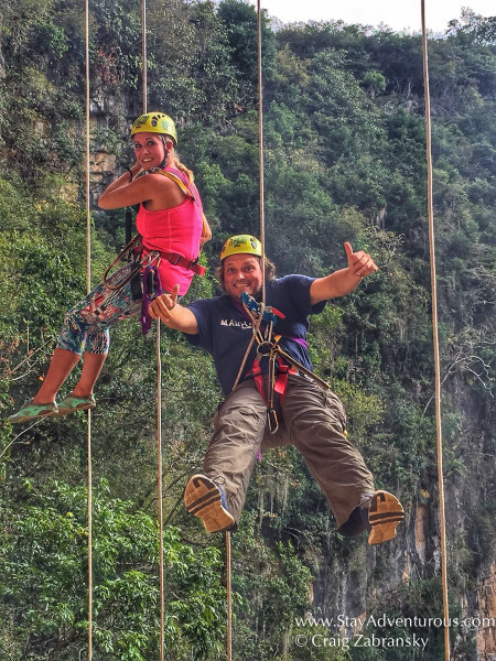 dangling over the sinkhole of parrots outside tuxtla gutierrez, chiapas, mexico