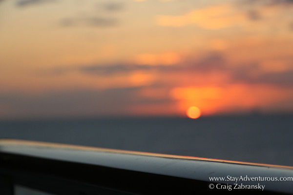 the balcony room of 12110 at sunset off the coast of Costa Maya on board the NCL Getaway Western Caribbean Cruise