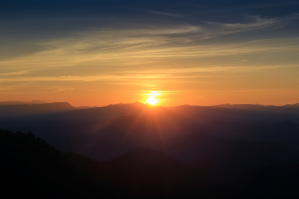 a blue ridge mountian sunset in Virginia on the Applachian Trail at McAfee Knob