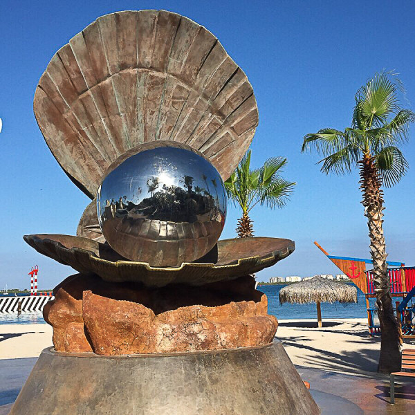 the perarl sculpture on the malecon in la paz mexico