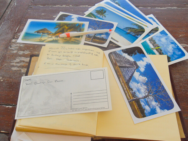 writing postcards on travels to Mexico