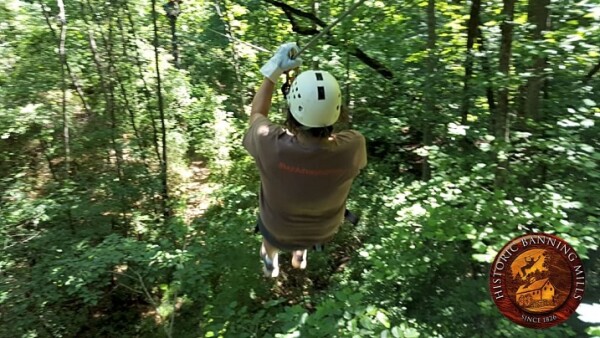 zippling through the longest zipline course found at Historic Banning Mills