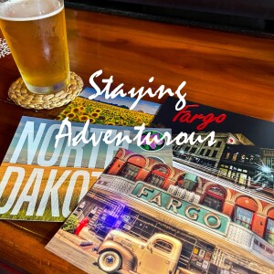 sipping a beer pint in fargo, north dakota writing postcards