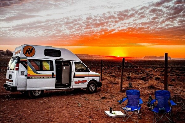 sunset with a campervan in nature